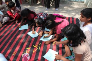 Drawing the picture of story idea. Story workshop at Tulapura